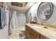 Clean bathroom with granite countertop and large vanity mirror at 25639 S Beech Creek Dr, Sun Lakes, AZ 85248