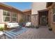 Inviting courtyard with seating area and brick accents at 2595 S Jeffry St, Gilbert, AZ 85295