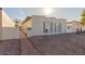 Updated single story home with front walkway and rock landscaping at 315 W Pebble Beach Dr, Tempe, AZ 85282