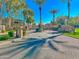 Gated entrance to community with landscaping and signage at 3800 S Cantabria Cir # 1100, Chandler, AZ 85248