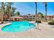 Community pool with a relaxing atmosphere and surrounding landscaping at 3800 S Cantabria Cir # 1100, Chandler, AZ 85248