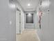 Clean hallway with light gray walls and tile flooring at 420 N Benson Ln, Chandler, AZ 85224