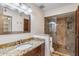 Bathroom features granite countertop, large shower, and tiled walls at 5414 N 78Th Pl, Scottsdale, AZ 85250