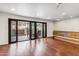 Living room with hardwood floors and view of the backyard patio at 5414 N 78Th Pl, Scottsdale, AZ 85250