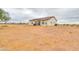 House exterior view with large backyard at 6293 N Telly Ln, Casa Grande, AZ 85194