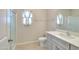 Clean bathroom, featuring a shower, toilet and vanity with quartz countertop at 6293 N Telly Ln, Casa Grande, AZ 85194