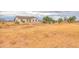 Large lot with a new construction home and a view of surrounding desert landscape at 6293 N Telly Ln, Casa Grande, AZ 85194