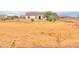 Large lot with a new construction home and a view of surrounding desert landscape at 6293 N Telly Ln, Casa Grande, AZ 85194