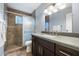 Bathroom features a large shower and dark vanity at 6805 E 2Nd St # 4, Scottsdale, AZ 85251
