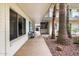 Exterior walkway with palm trees and building entryway at 6805 E 2Nd St # 4, Scottsdale, AZ 85251