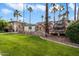 Landscaped grounds with a stone wall and waterfall feature at 6805 E 2Nd St # 4, Scottsdale, AZ 85251