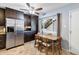 Eat-in kitchen with stainless steel appliances and wood dining table at 6805 E 2Nd St # 4, Scottsdale, AZ 85251