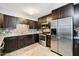 Updated kitchen, stainless steel appliances, dark wood cabinets at 6805 E 2Nd St # 4, Scottsdale, AZ 85251