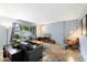 Living room with comfortable seating and views of the pool and courtyard at 6805 E 2Nd St # 4, Scottsdale, AZ 85251