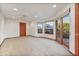 Carpeted bedroom with sliding doors leading to the patio at 8437 N 84Th Pl, Scottsdale, AZ 85258