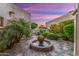 Private courtyard with a water feature and lush landscaping at 8437 N 84Th Pl, Scottsdale, AZ 85258