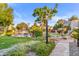 Landscaped walkway with pond and seating areas at 8437 N 84Th Pl, Scottsdale, AZ 85258