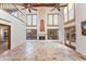 Spacious living room with high ceilings, fireplace and tile floors at 8437 N 84Th Pl, Scottsdale, AZ 85258