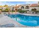 Inviting community swimming pool with lounge chairs at 8437 N 84Th Pl, Scottsdale, AZ 85258