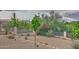 Landscaped backyard with desert plants, gravel, and a rock border at 9446 E Romping Rd, Carefree, AZ 85377