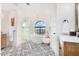 Elegant bathroom with freestanding tub, walk-in shower, and patterned floor at 9446 E Romping Rd, Carefree, AZ 85377