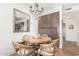 Bright breakfast nook featuring a round table and chandelier at 9446 E Romping Rd, Carefree, AZ 85377