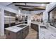 Modern kitchen with granite countertops and stainless steel appliances at 9446 E Romping Rd, Carefree, AZ 85377