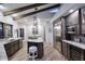 Updated kitchen features granite countertops, stainless steel appliances, and an island at 9446 E Romping Rd, Carefree, AZ 85377