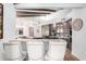 Breakfast bar in kitchen with granite countertops and stylish seating at 9446 E Romping Rd, Carefree, AZ 85377