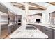 Gourmet kitchen boasts granite countertops, stainless steel appliances, and an island at 9446 E Romping Rd, Carefree, AZ 85377
