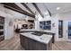 Spacious kitchen features granite countertops, stainless steel appliances, and an open layout at 9446 E Romping Rd, Carefree, AZ 85377