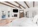 Main bedroom featuring a fireplace and large windows at 9446 E Romping Rd, Carefree, AZ 85377