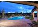 Lovely kidney-shaped pool with a patio and landscape at 9446 E Romping Rd, Carefree, AZ 85377