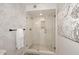 Walk-in shower with glass enclosure and modern tile at 9446 E Romping Rd, Carefree, AZ 85377