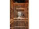 Custom-built wine cellar with extensive storage for wine bottles at 10125 E Sundance Trl, Scottsdale, AZ 85262