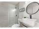 Clean bathroom with a walk-in shower, floating vanity, and modern decor at 102 W Kerry Ln, Phoenix, AZ 85027