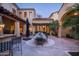 Outdoor patio with large dining table and seating at 10234 E Journey Ln, Scottsdale, AZ 85255