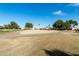 View of a serene golf course with lush green fairways and landscaping at 15140 W Gunsight Dr, Sun City West, AZ 85375