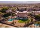 Aerial view of house, pool, and surrounding neighborhood at 16604 S 11Th Ave, Phoenix, AZ 85045