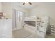 Cozy bedroom with a built-in bunk bed and ample storage at 16604 S 11Th Ave, Phoenix, AZ 85045