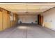 Two-car garage with built-in storage cabinets and shelving at 17218 N Desert Glen Dr, Sun City West, AZ 85375