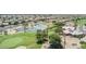 Beautiful golf course with lush greens, water features, and surrounding homes at 17218 N Desert Glen Dr, Sun City West, AZ 85375