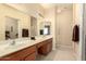 Bathroom with double sinks and a walk-in shower at 2101 S Yellow Wood -- # 89, Mesa, AZ 85209