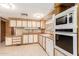 Bright kitchen features ample cabinetry and modern appliances at 245 S 56Th St # 75, Mesa, AZ 85206