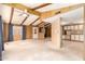 Spacious living room featuring wood paneling and high ceilings at 245 S 56Th St # 75, Mesa, AZ 85206
