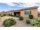 Landscaped backyard with patio and seating area at 2456 E Lindrick Dr, Gilbert, AZ 85298