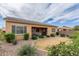 Backyard patio with seating and grill at 2456 E Lindrick Dr, Gilbert, AZ 85298