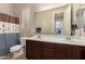 Clean bathroom with double vanity and shower at 2456 E Lindrick Dr, Gilbert, AZ 85298