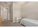 Bedroom with twin bed and built-in shelving at 2456 E Lindrick Dr, Gilbert, AZ 85298