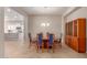 Dining room with a wood hutch and chandelier lighting at 2456 E Lindrick Dr, Gilbert, AZ 85298